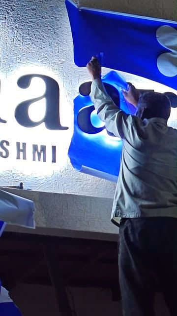 The Naari by Rashmi sign being installed